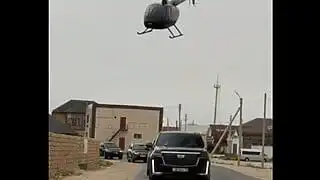 В Казнете обсуждают выпускной в Жанаозене с кортежем люксовых авто и вертолётом
